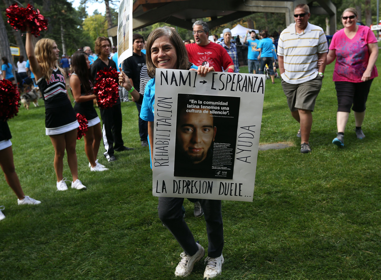 Estela Marquez starts the National Alliance on Mental Illness Utah's annual NAMI Walk at Liberty Park in Salt Lake City on Saturday, Sept. 6, 2014. (Photo: Kristin Murphy, Deseret News)