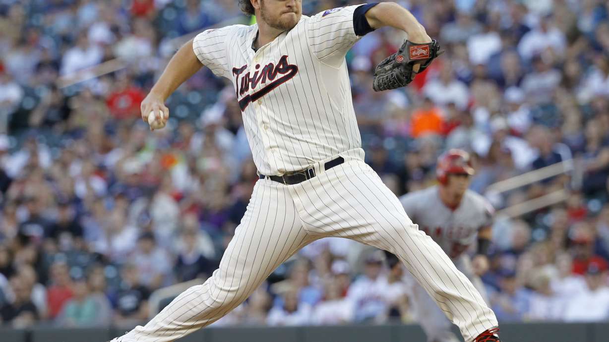 Twins bullpen fails to hold lead for Hughes