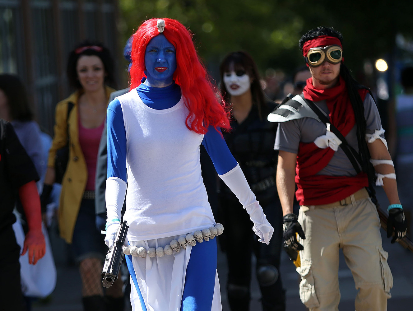 Salt Lake Comic Con attendees walk through downtown Salt Lake City on Saturday, Sept. 6, 2014.