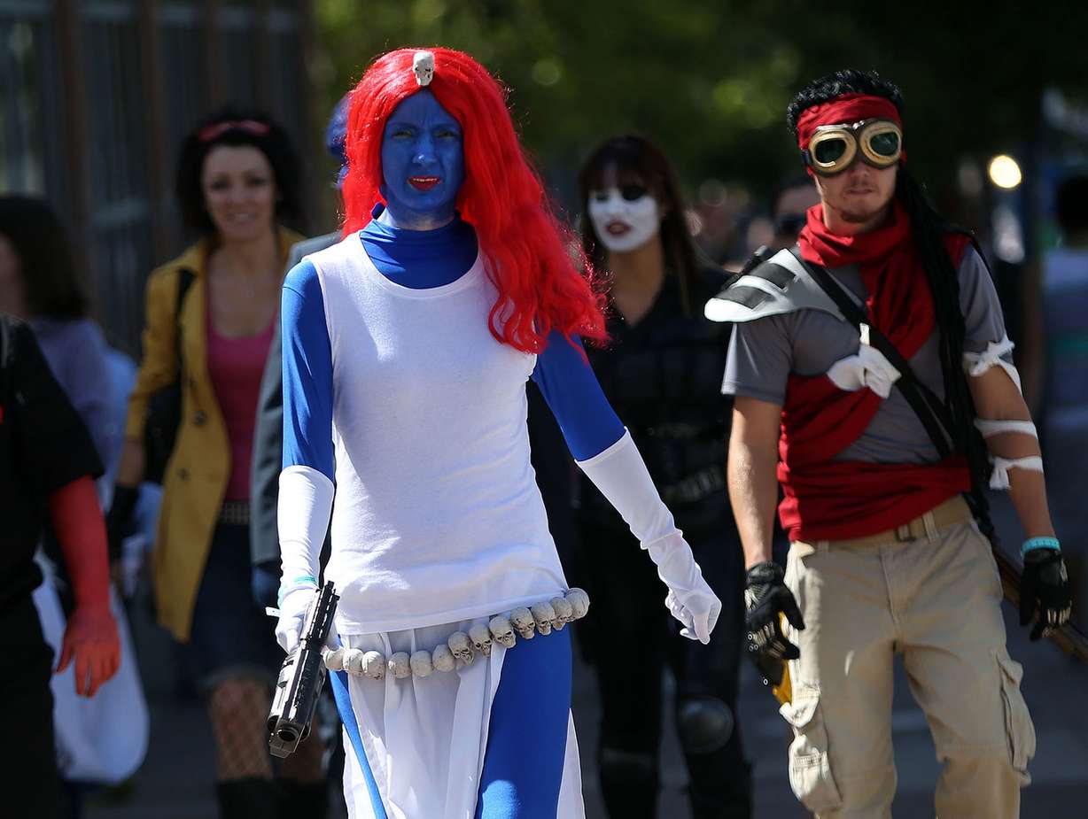 Salt Lake Comic Con attendees walk through downtown Salt Lake City on Saturday, Sept. 6, 2014.