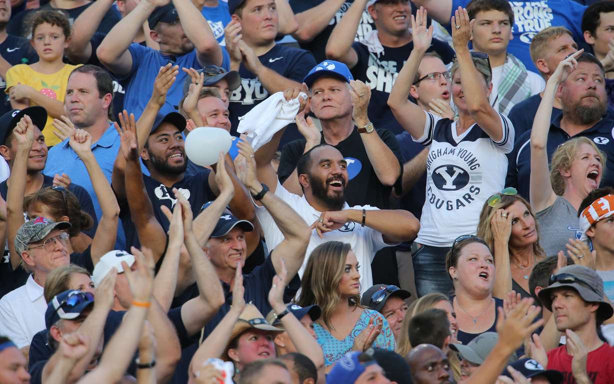 BYU fans cheer as BYU and Texas play Saturday, Sept. 6, 2014, in Austin Texas.