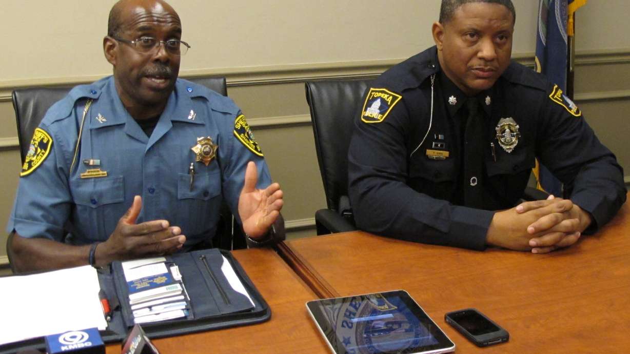 2 men arrested in death of Kansas police officer