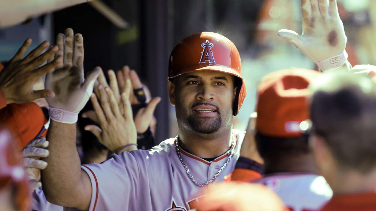 Weaver wins 16th as Angels rout Indians 12-3