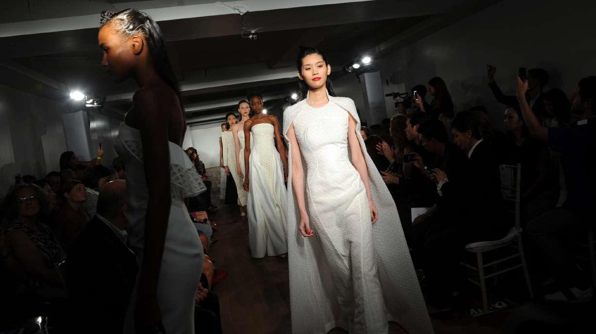 Zac Posen molds neoprene into bustiers and bustles