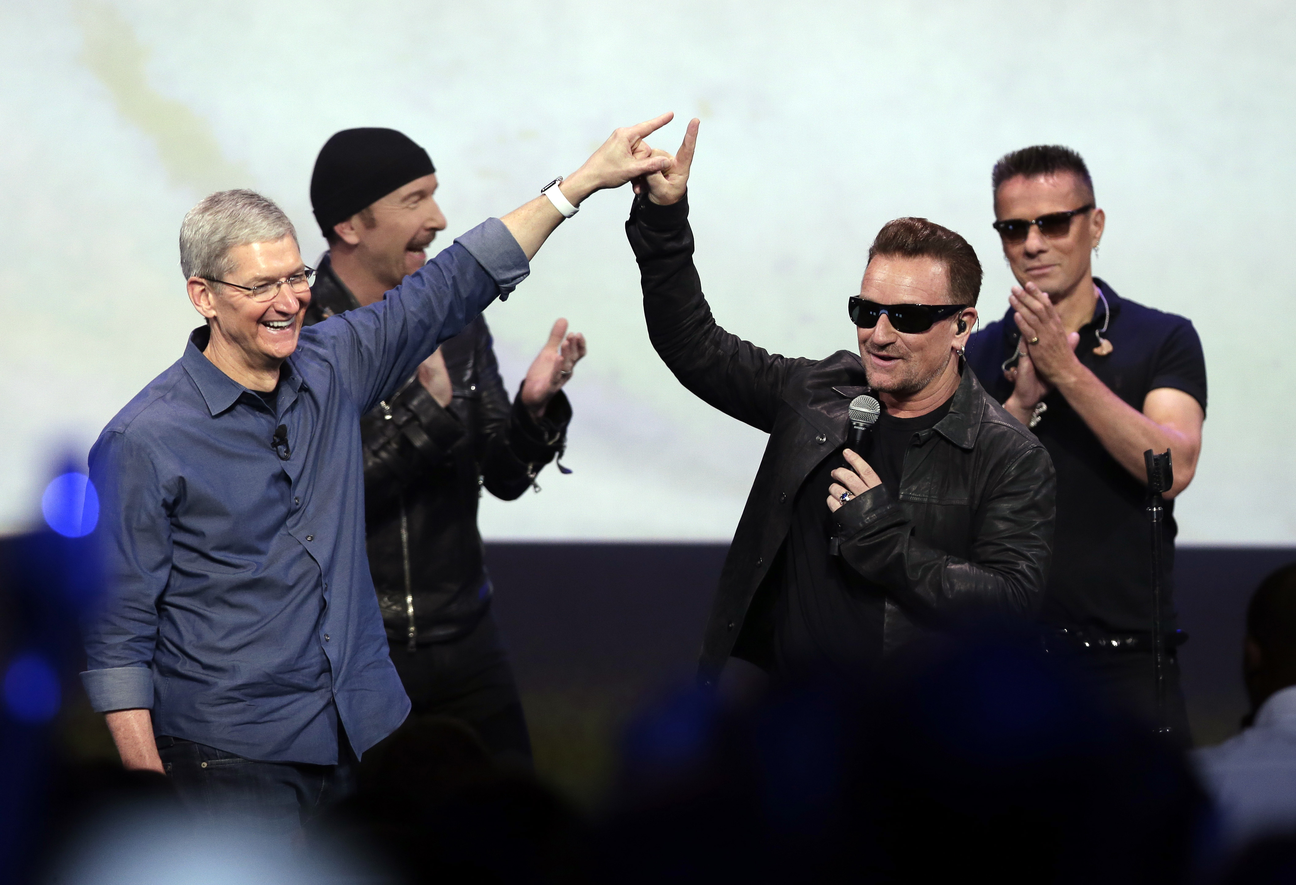 U2 drops surprise album at Apple unveiling