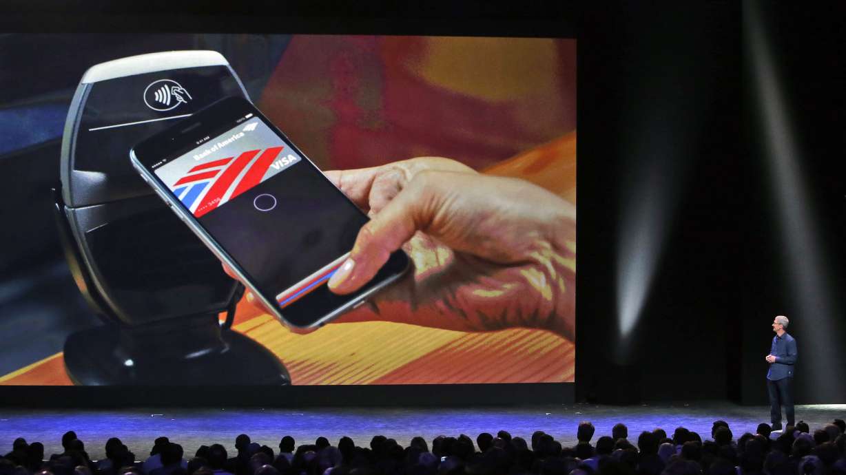 Apple pushes digital wallet with Apple Pay