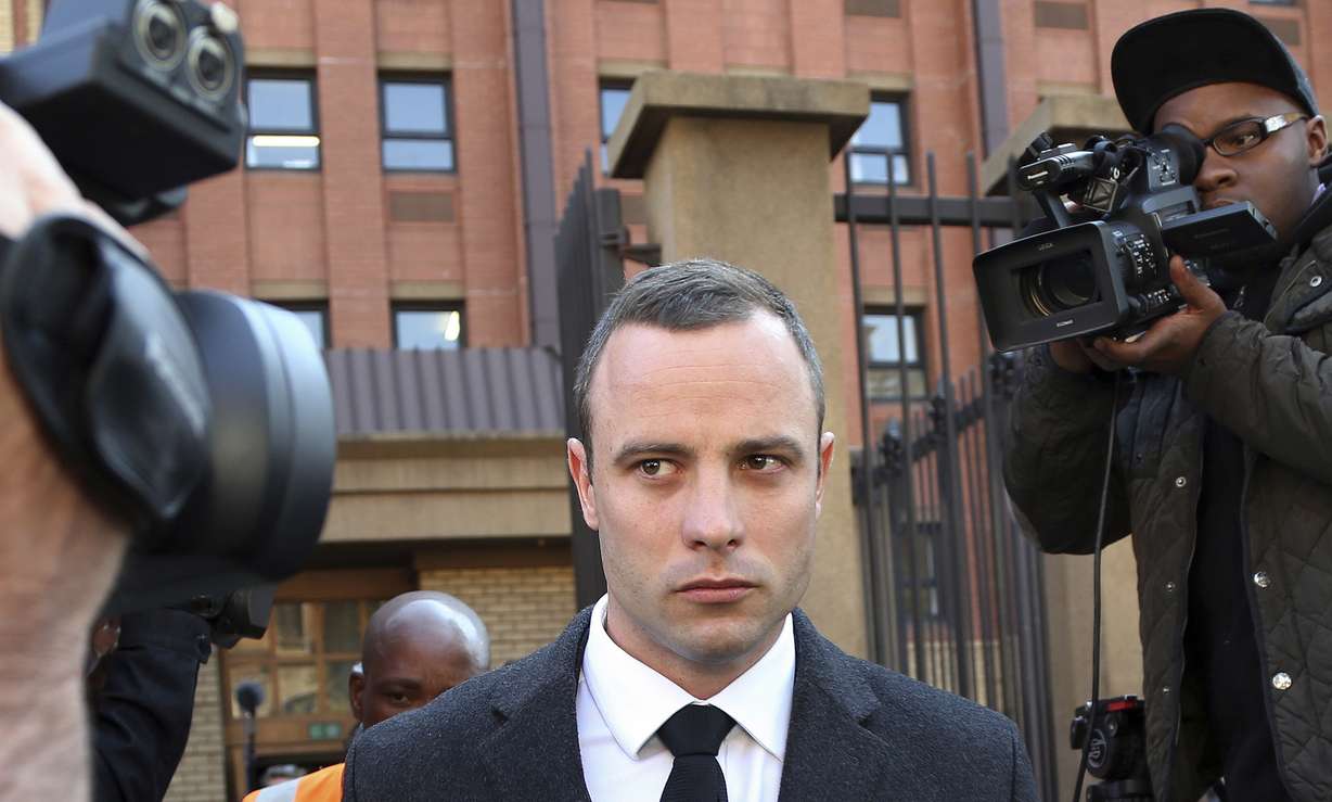 In this Tuesday May, 20, 2014, file photo Oscar Pistorius outide the HIgh Court in Pretoria, South Africa. Presiding Judge Thokozile Masipa is expected to announce her verdict in Pistorius' murder trail after scrutinizing evidence Thursday and Friday given by 37 witnesses in a court transcript running to thousands of pages in a drama that has played out over six months.