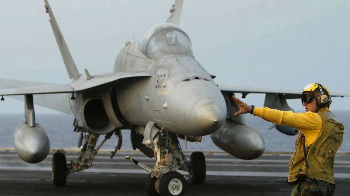 Rescuers end ocean search for Navy fighter pilot