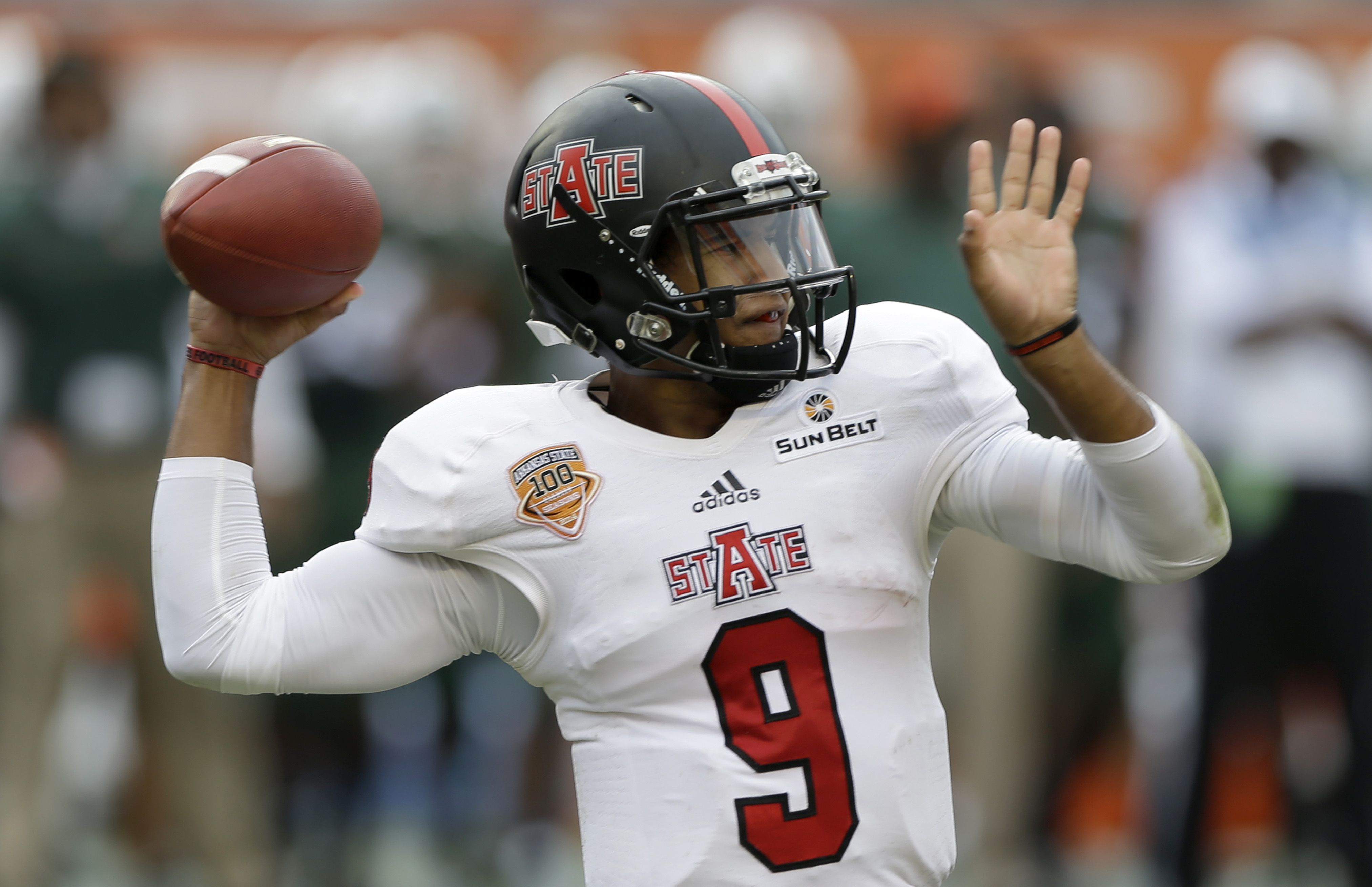 Arkansas St. rallies past Utah St. 21-14 in OT