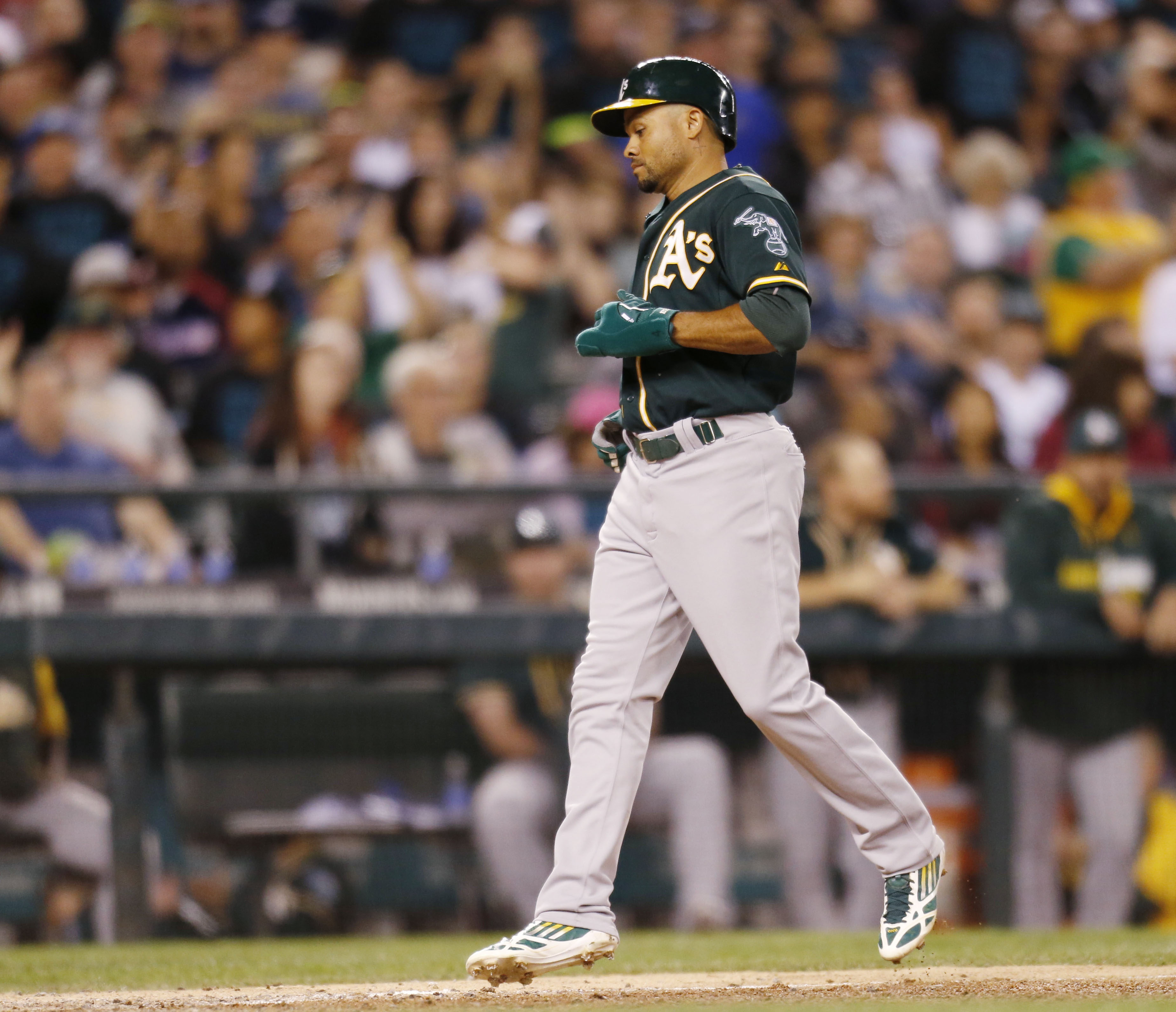 Lowrie draws bases-loaded walk in 10th to lift A's