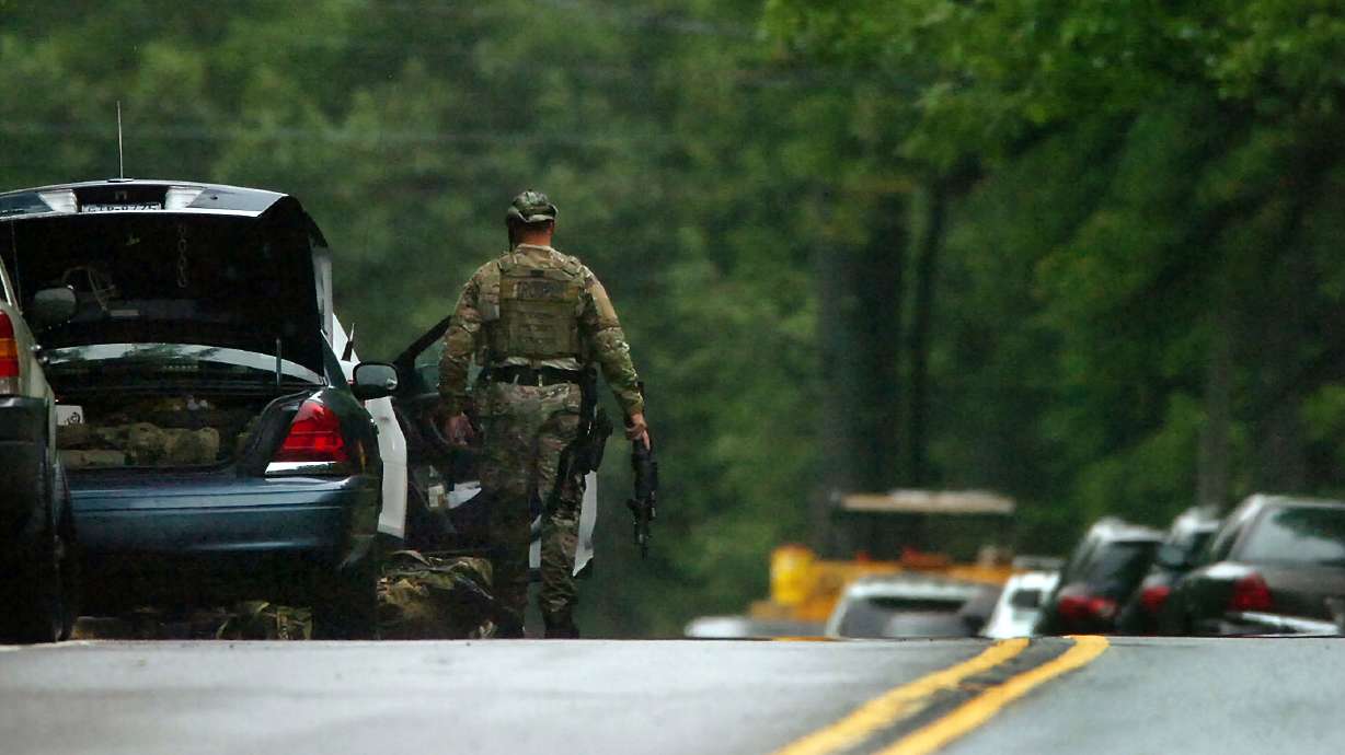 Police: Trooper hurt in ambush conscious, talking