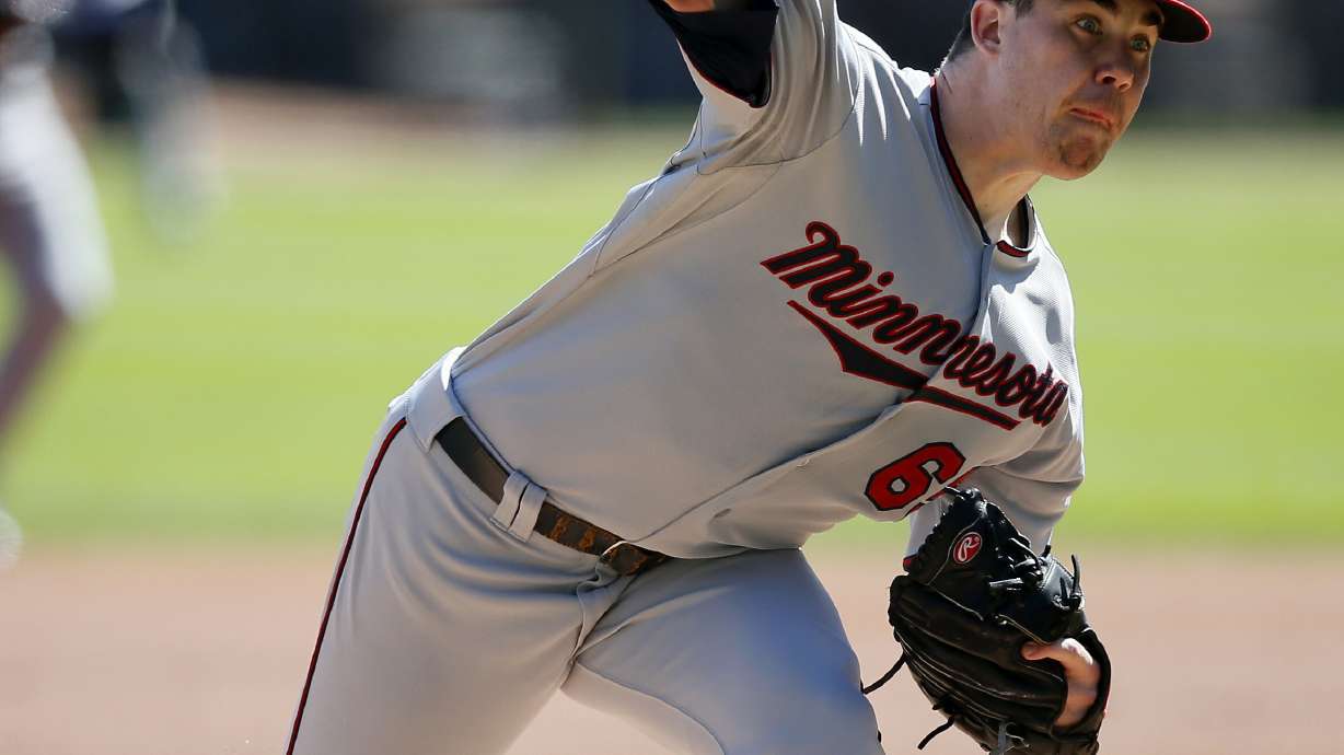 Rookie May fans 10 as Twins Beat White Sox 6-4