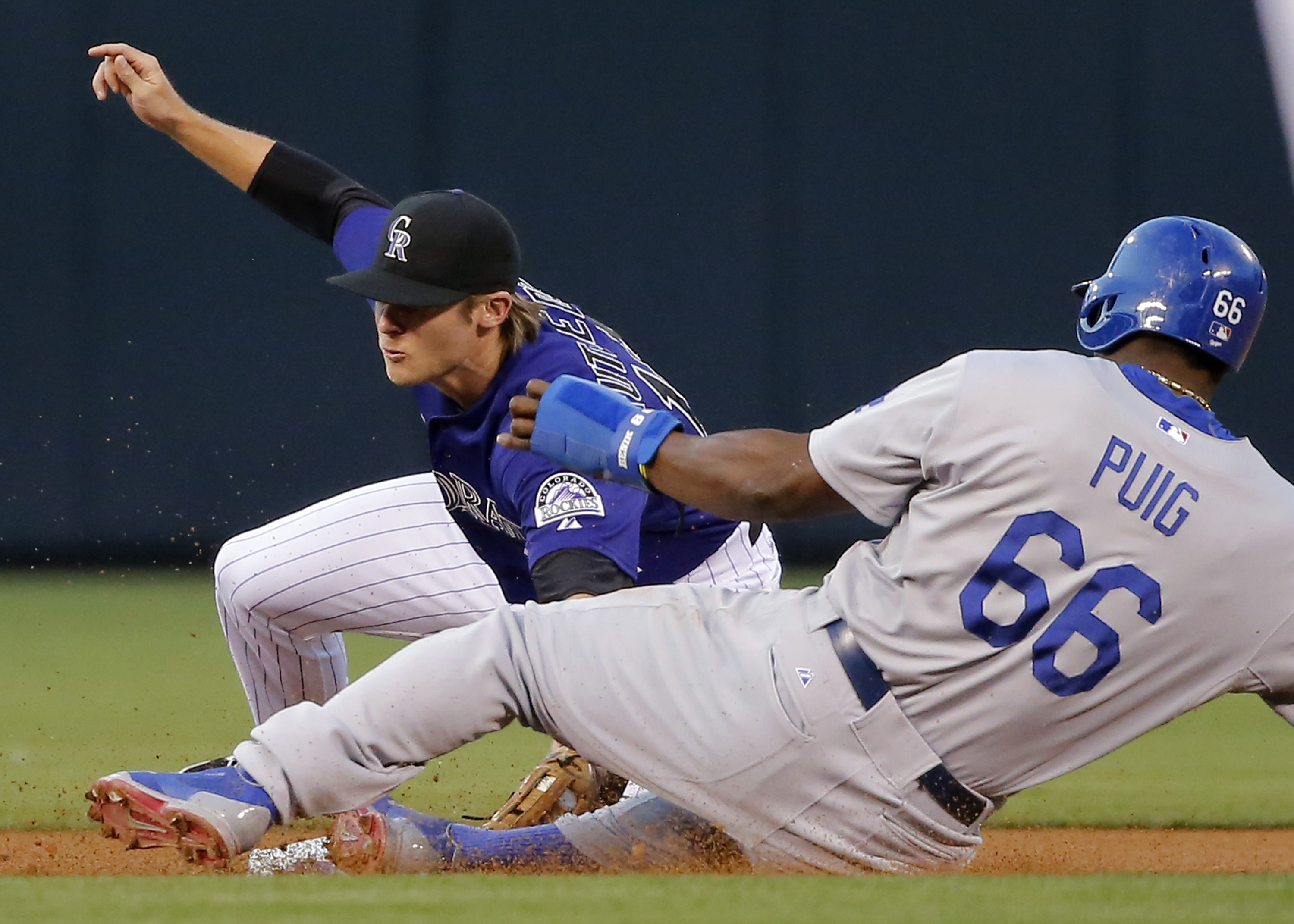 Eight-run 6th fuels Dodgers' 11-3 rout of Rockies
