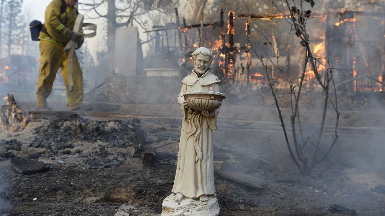 Lumber town takes stock after wind-driven wildfire