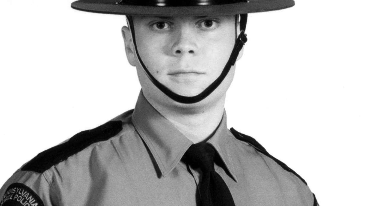 Hunt on for survivalist charged in trooper killing