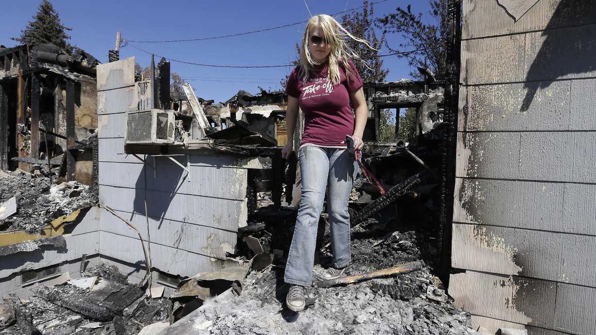 Woman in wildfire's path lost almost everything