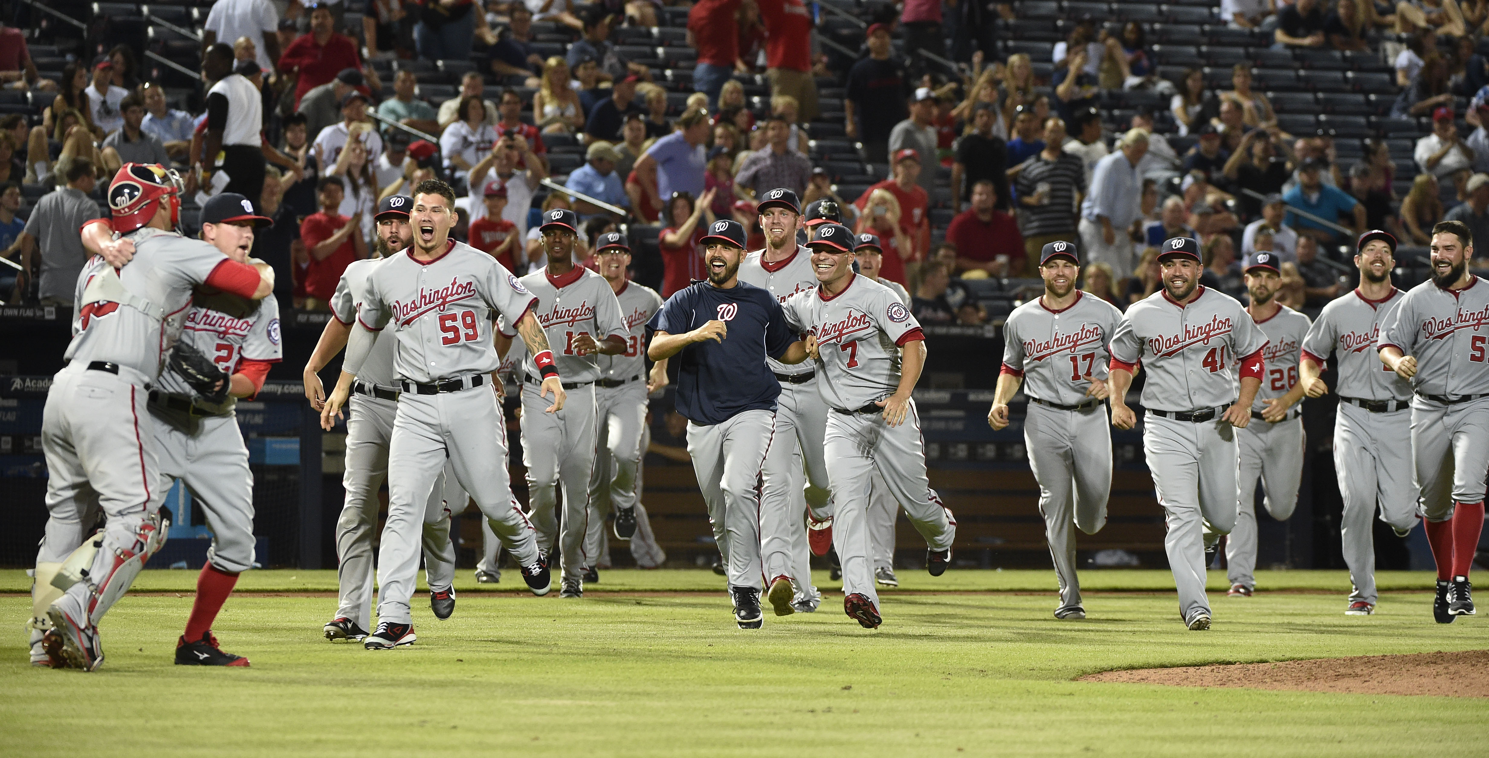 Fading Braves watch Nats celebrate NL East title