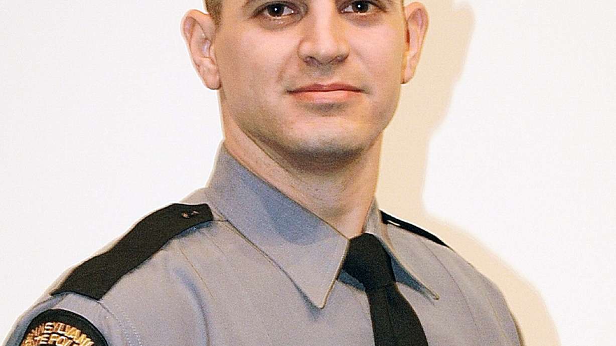 Police: Ambush suspect was military re-enactor