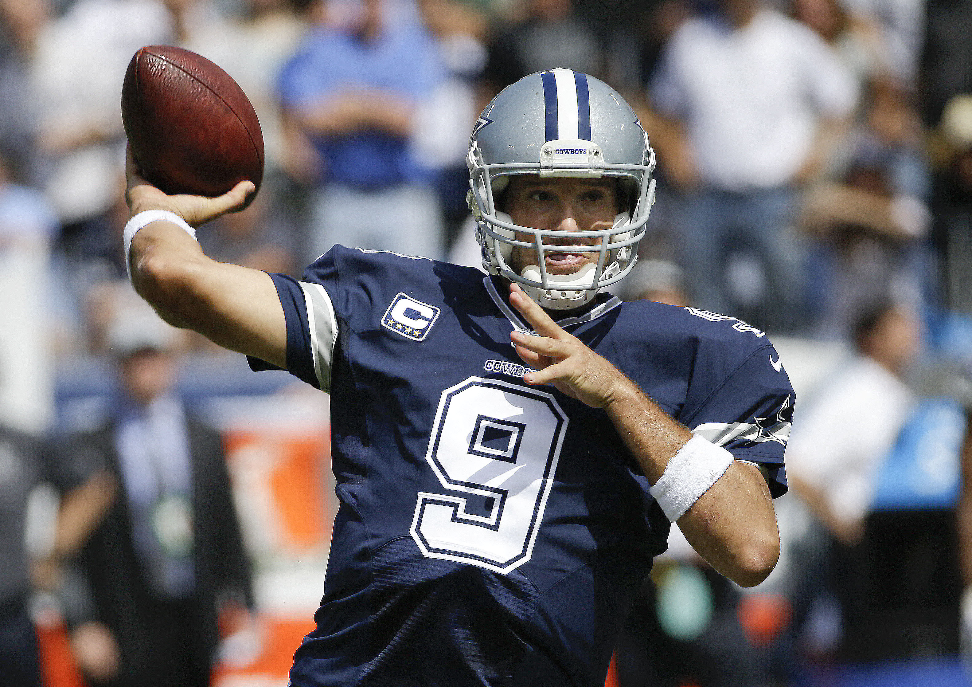 Cowboys' Romo misses practice, calls it routine