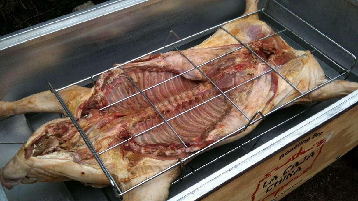 For a stellar tailgate, consider cooking a whole pig