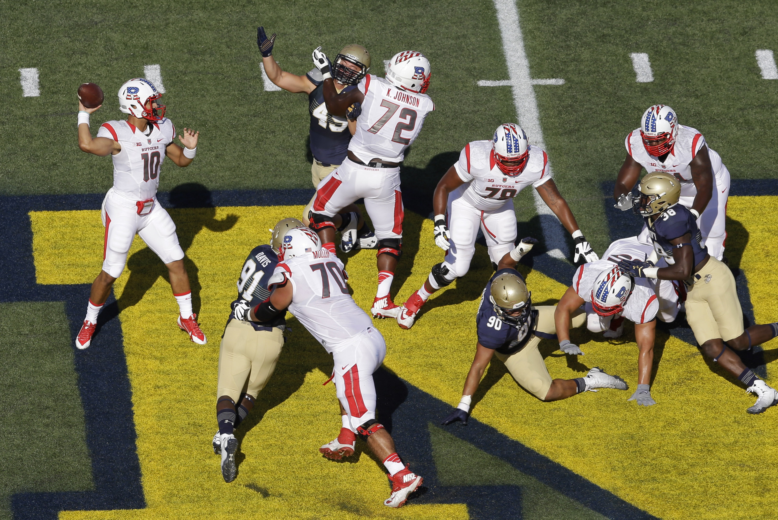 Ground game helps Rutgers beat Navy 31-24