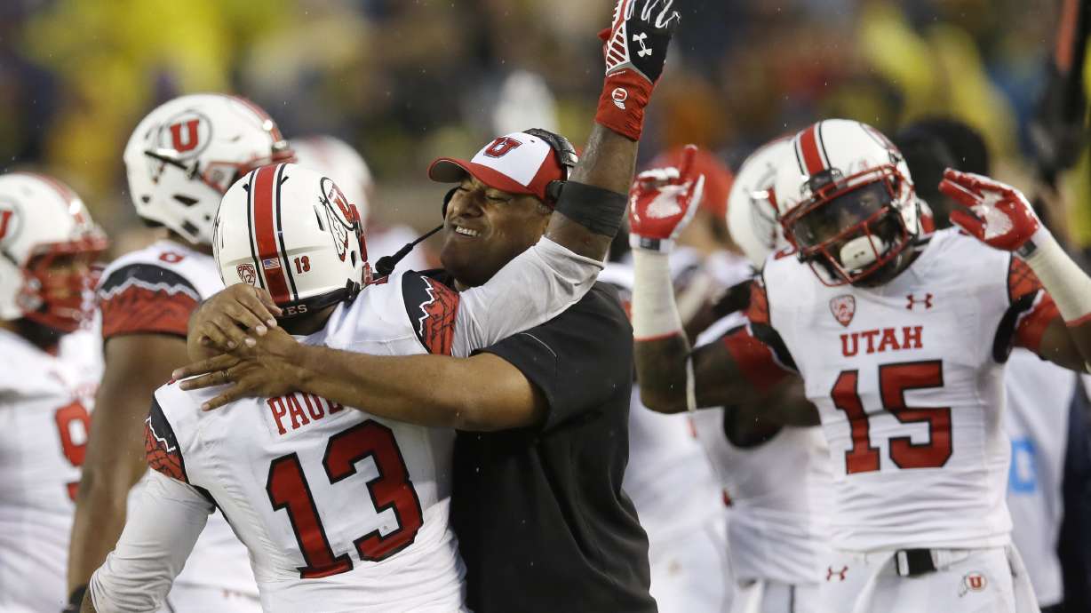 Utah waits out delay, beats Michigan 26-10