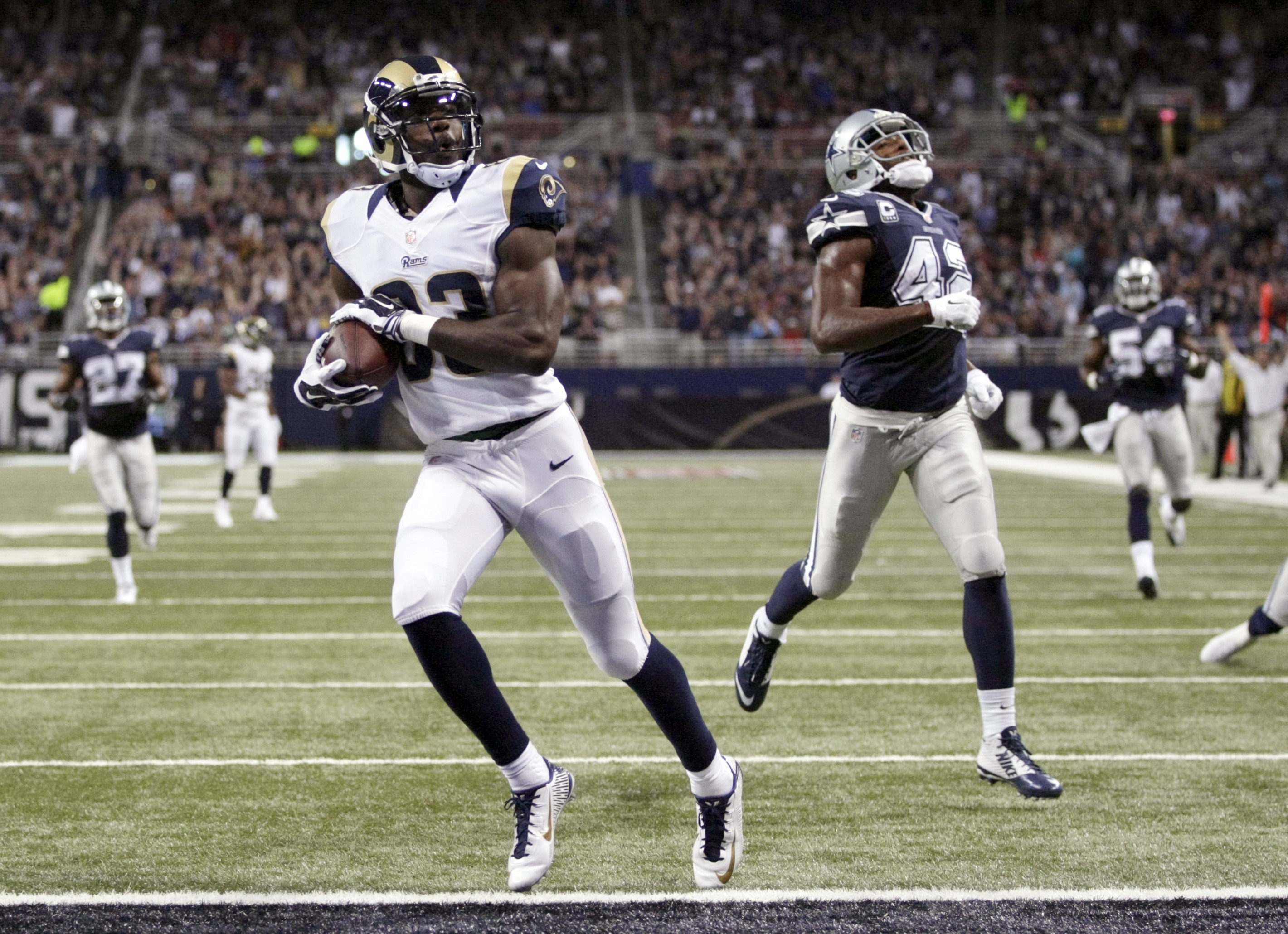 Cowboys erase 21-point deficit, beat Rams 34-31