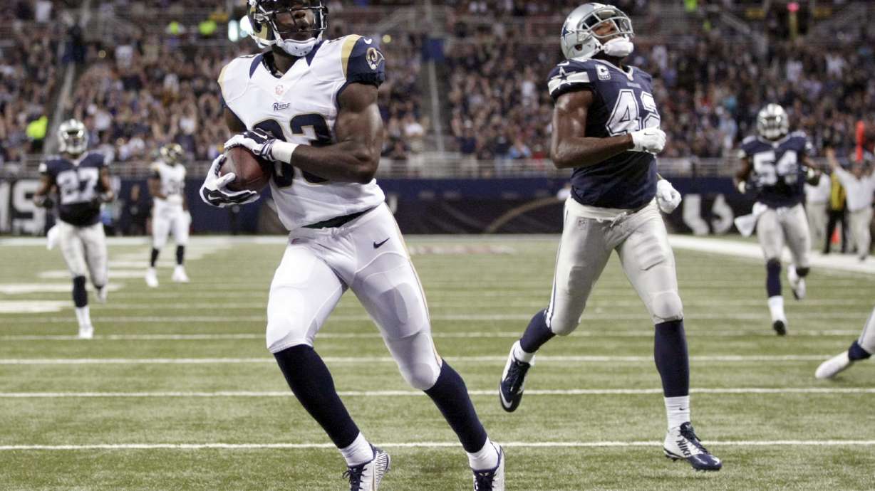 Cowboys erase 21-point deficit, beat Rams 34-31