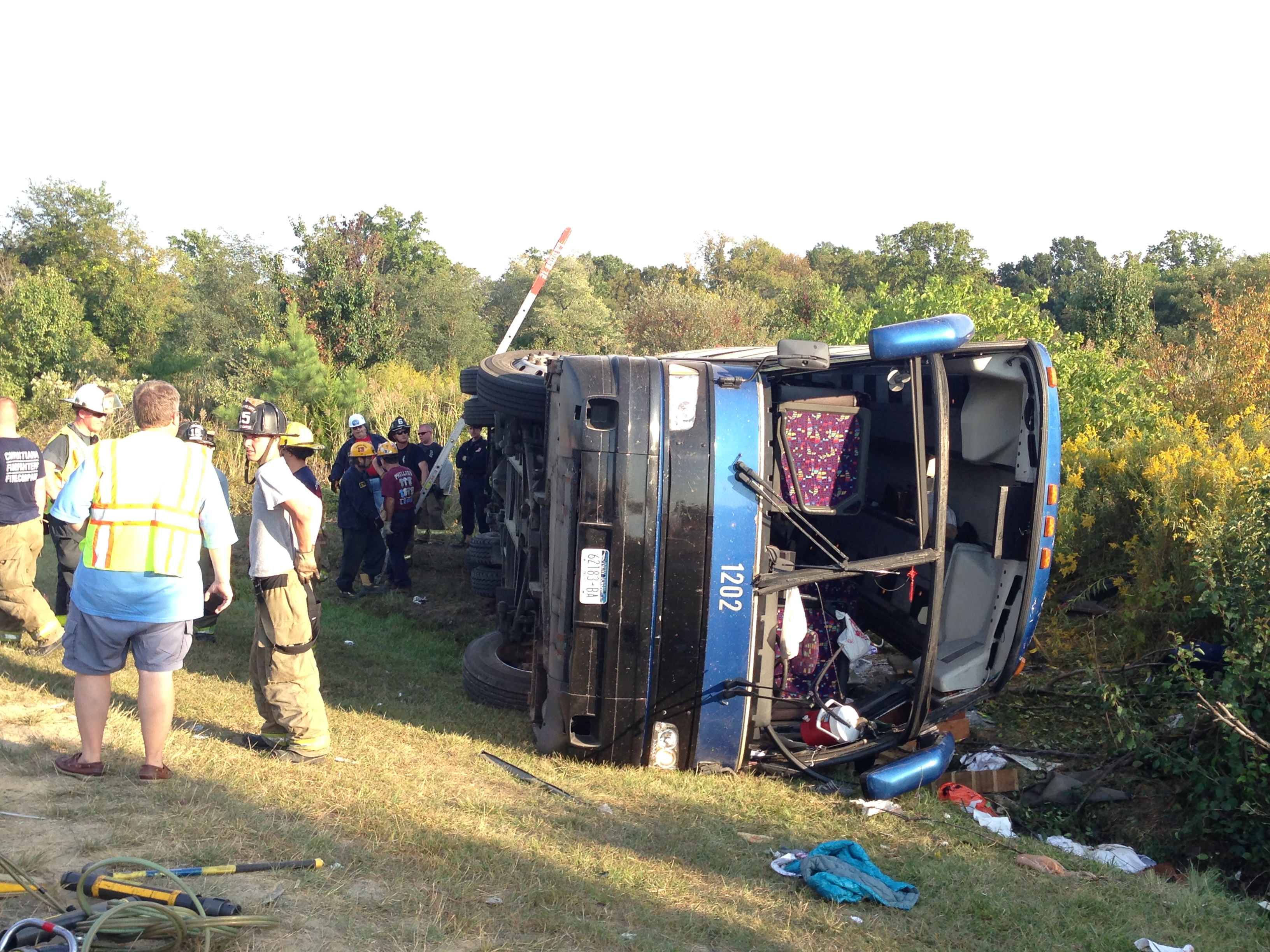 Del. authorities: Bus overturns, 1 dead, injuries
