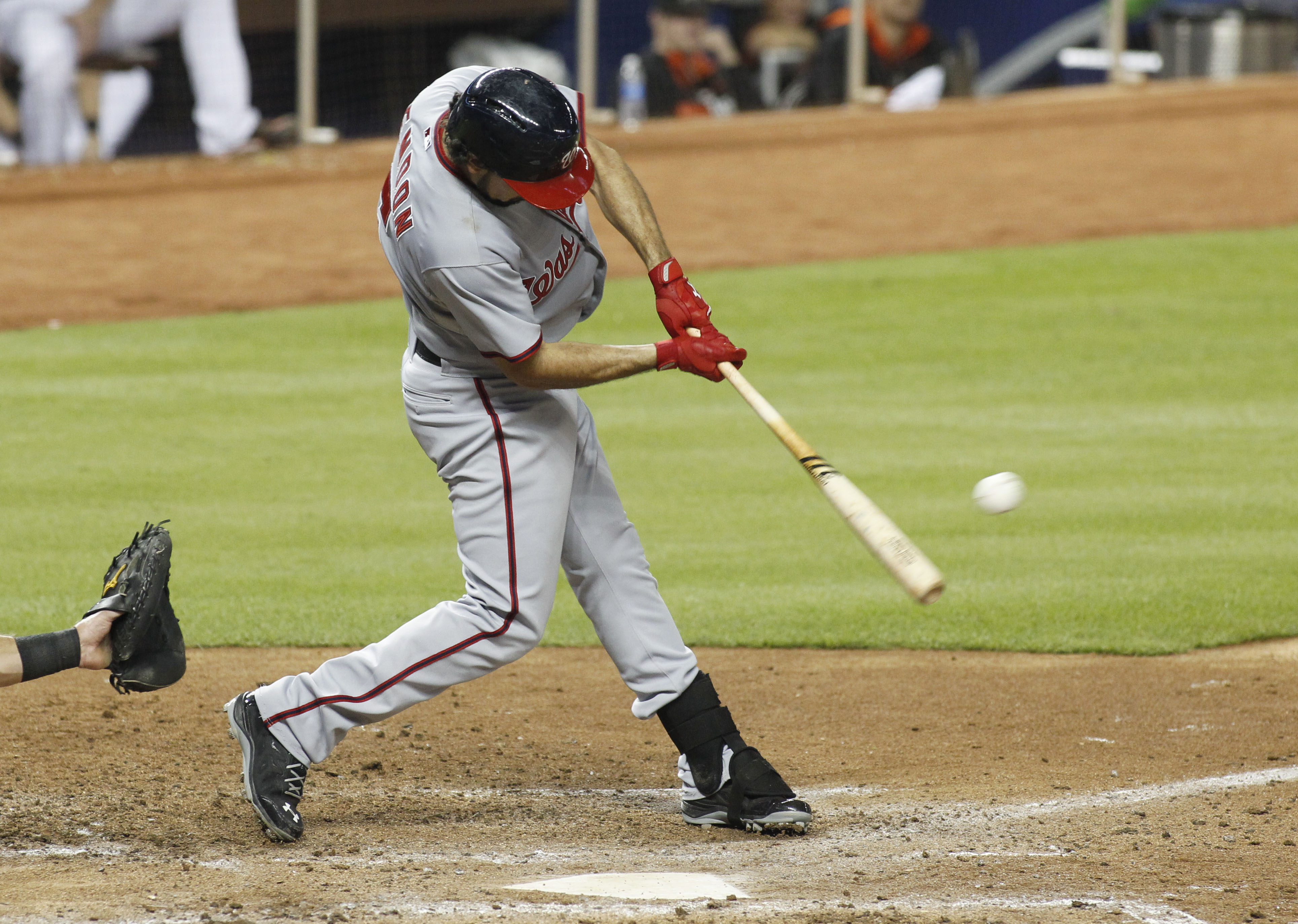 Ozuna hurt in Marlins' 2-1 loss to Nationals