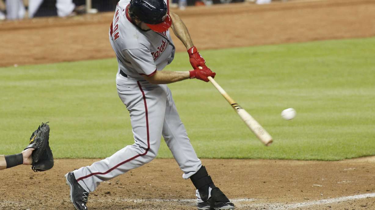 Ozuna hurt in Marlins' 2-1 loss to Nationals