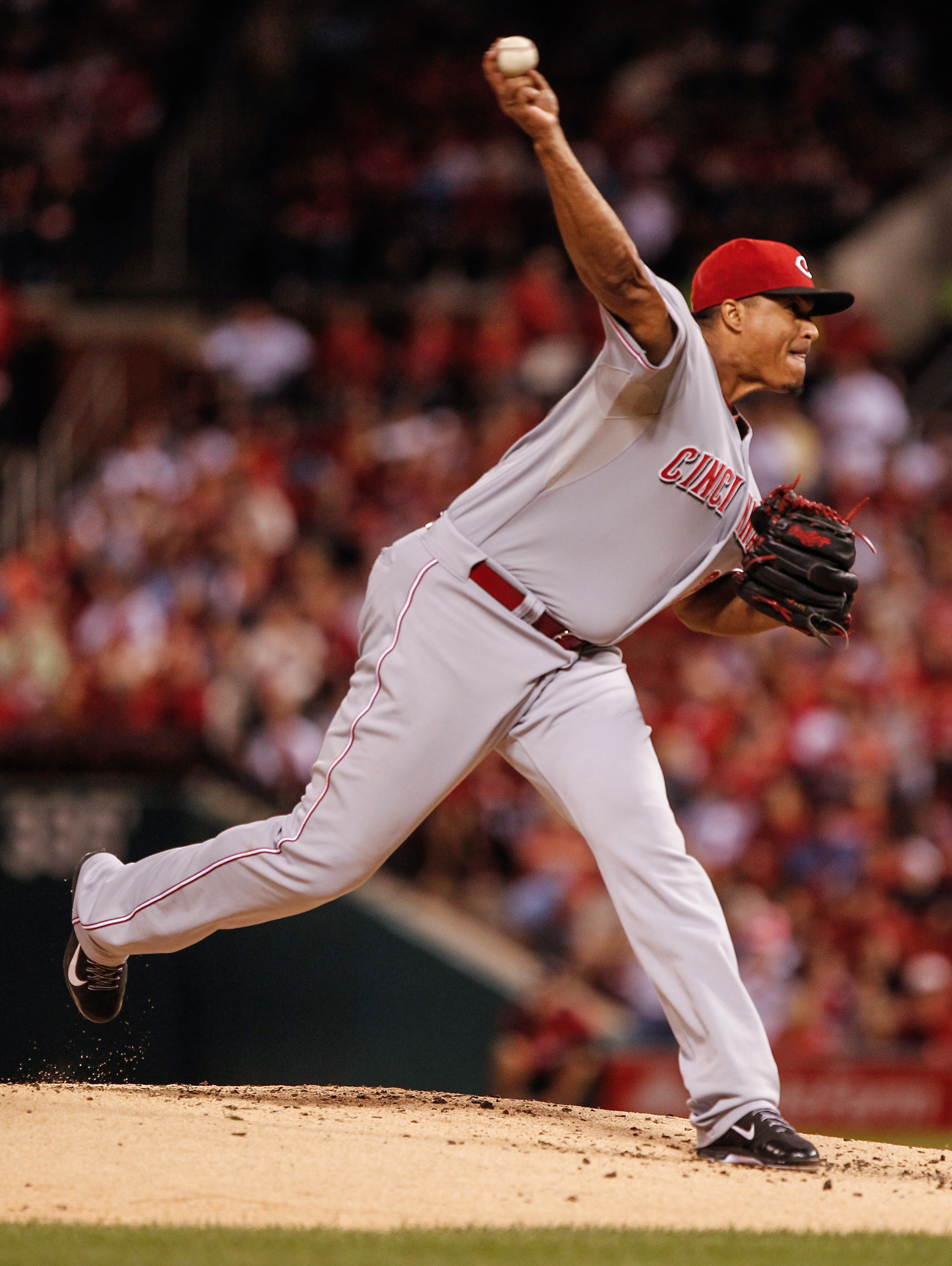 Cards clinch playoff spot, then lose 7-2 to Reds