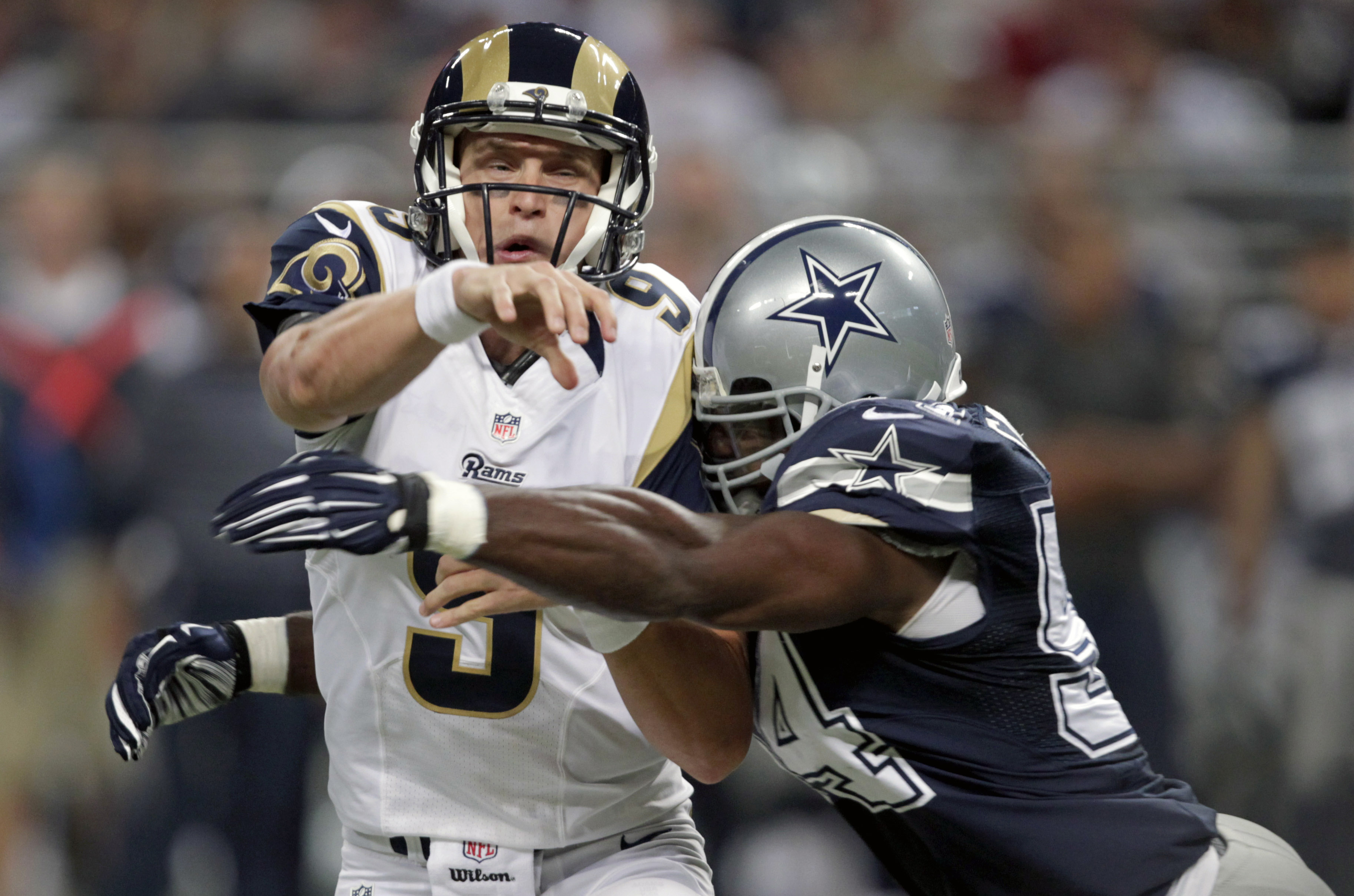 Cowboys erase 21-point deficit, beat Rams 34-31