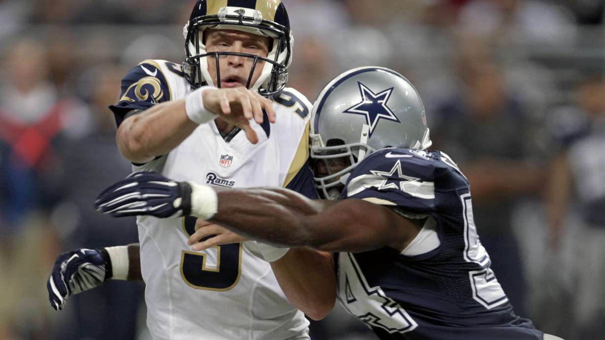 Cowboys erase 21-point deficit, beat Rams 34-31