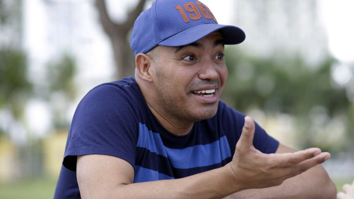 Cuban salsa singer split between island and US