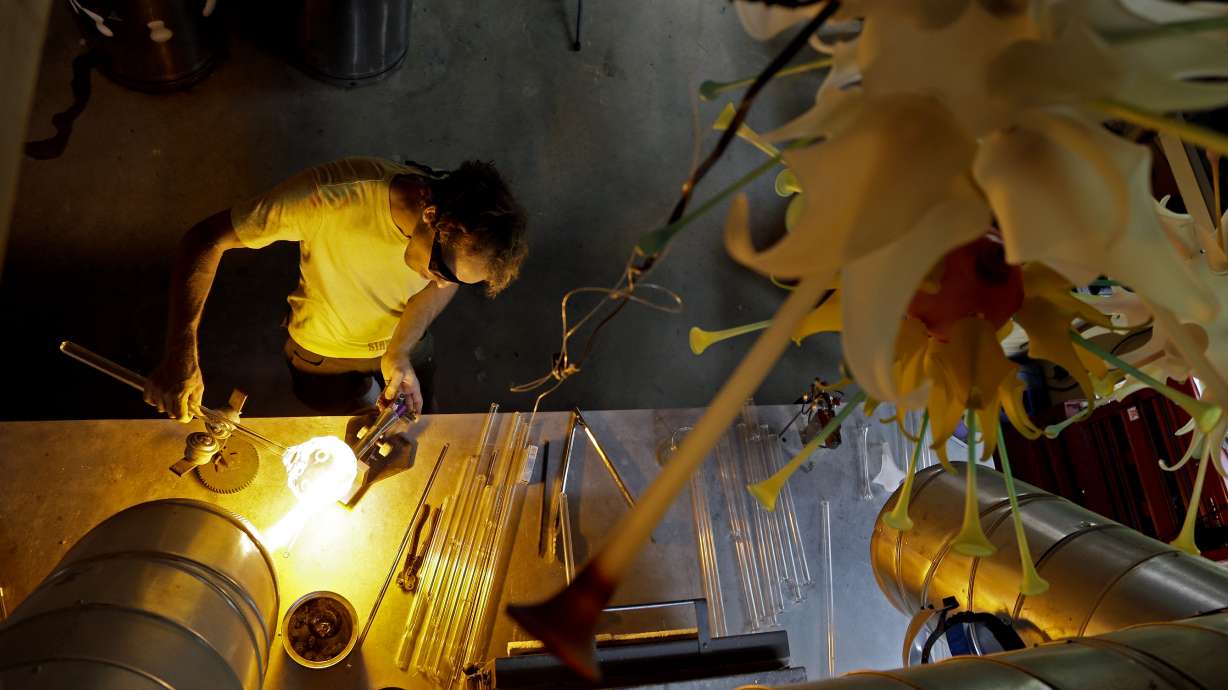 AP PHOTOS: NC artist burns glass into sculptures