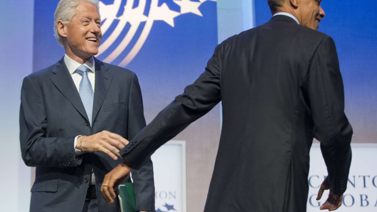 At Clinton confab, Obama praises role of citizens