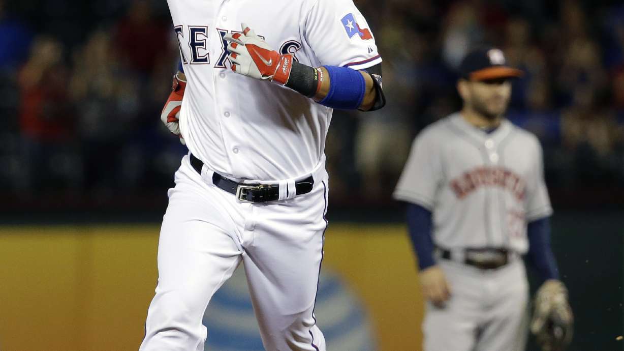 Martinez gets 1st home win as Rangers beat Astros