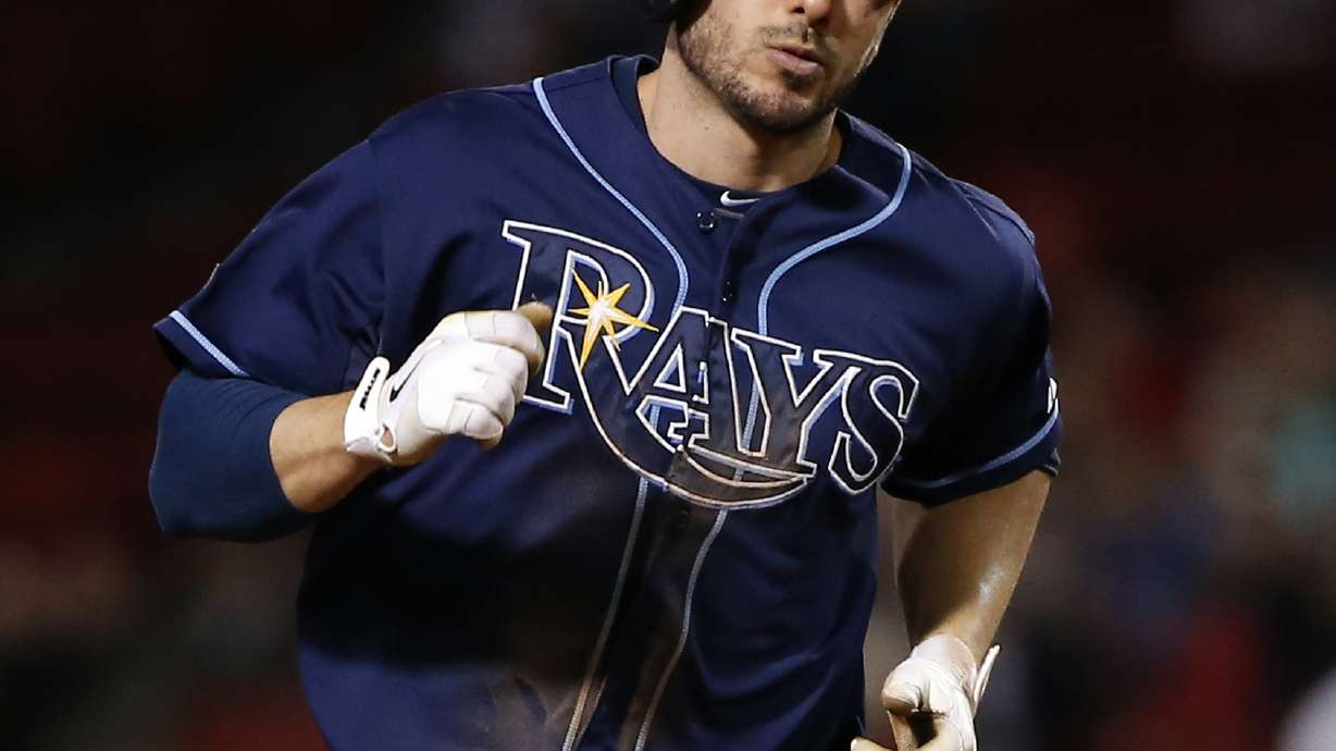 Rays strike late in 6-2 win at Boston