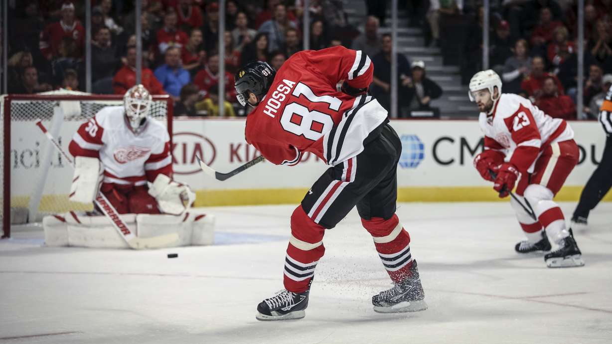 Toews' OT goal gives Blackhawks win over Red Wings