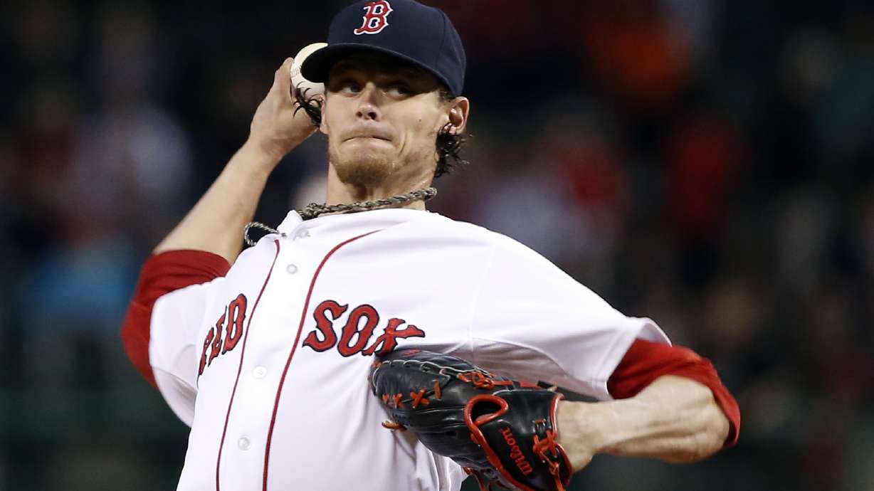 Rays strike late in 6-2 win at Boston