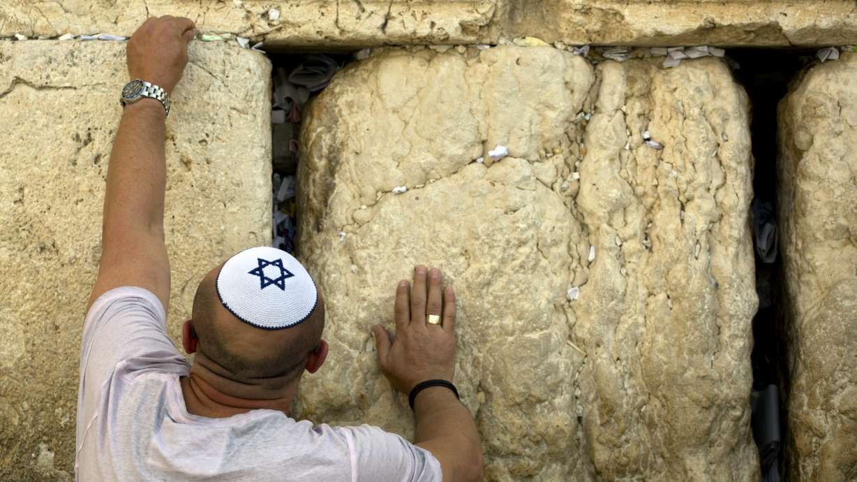 Israelis usher in Jewish New Year with uncertainty
