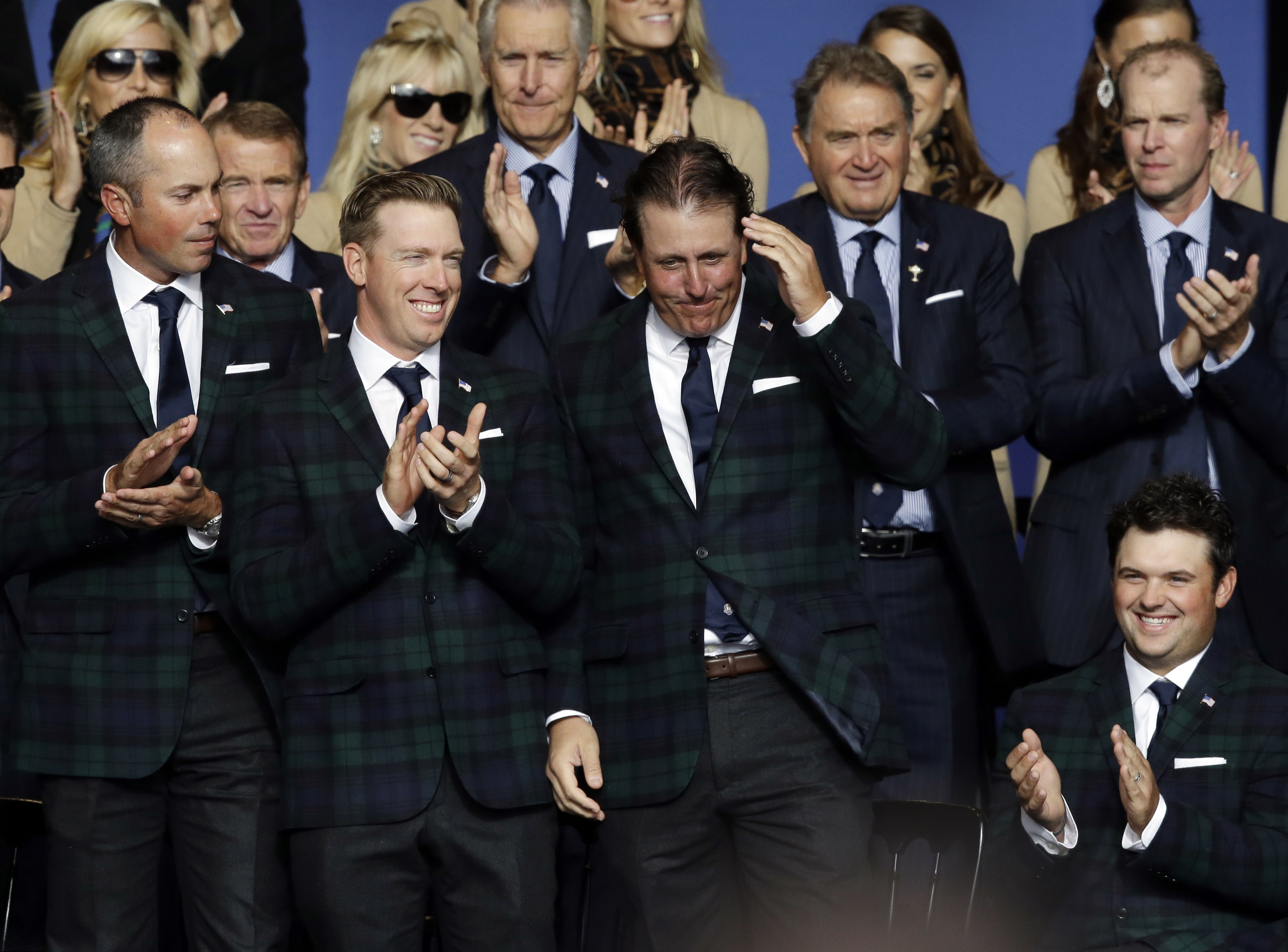 Mickelson, McIlroy square off in opening session