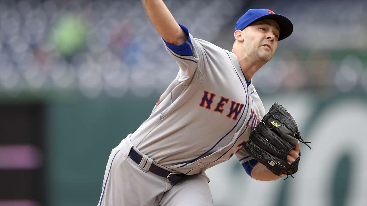 Gonzalez fans career high 12 as Nats, Mets split