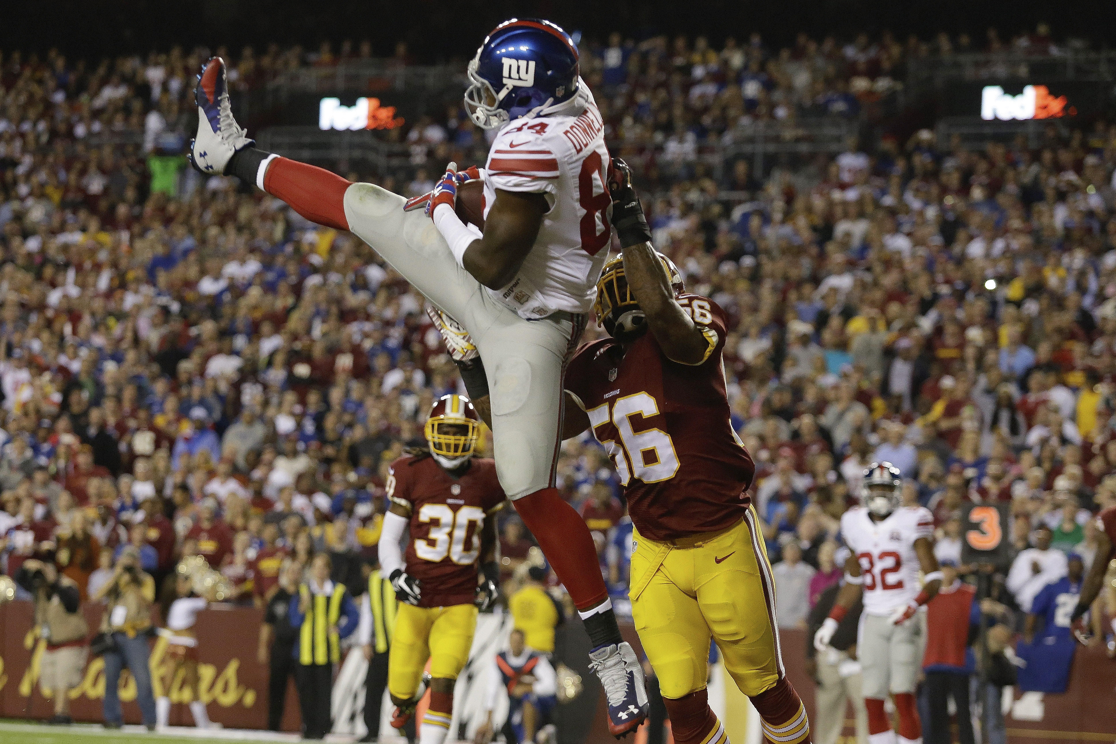 Cousins has 4 picks in Skins' 45-14 loss to Giants