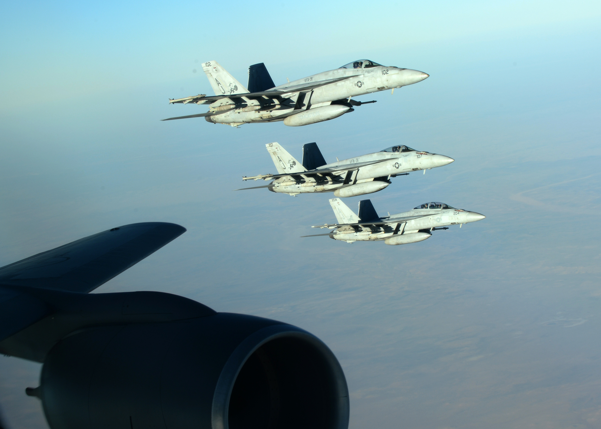 US-led strikes hit IS group as coalition grows