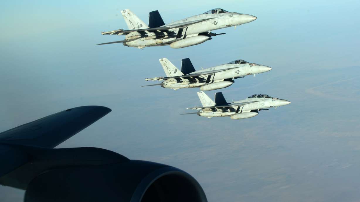 US-led strikes hit IS group as coalition grows