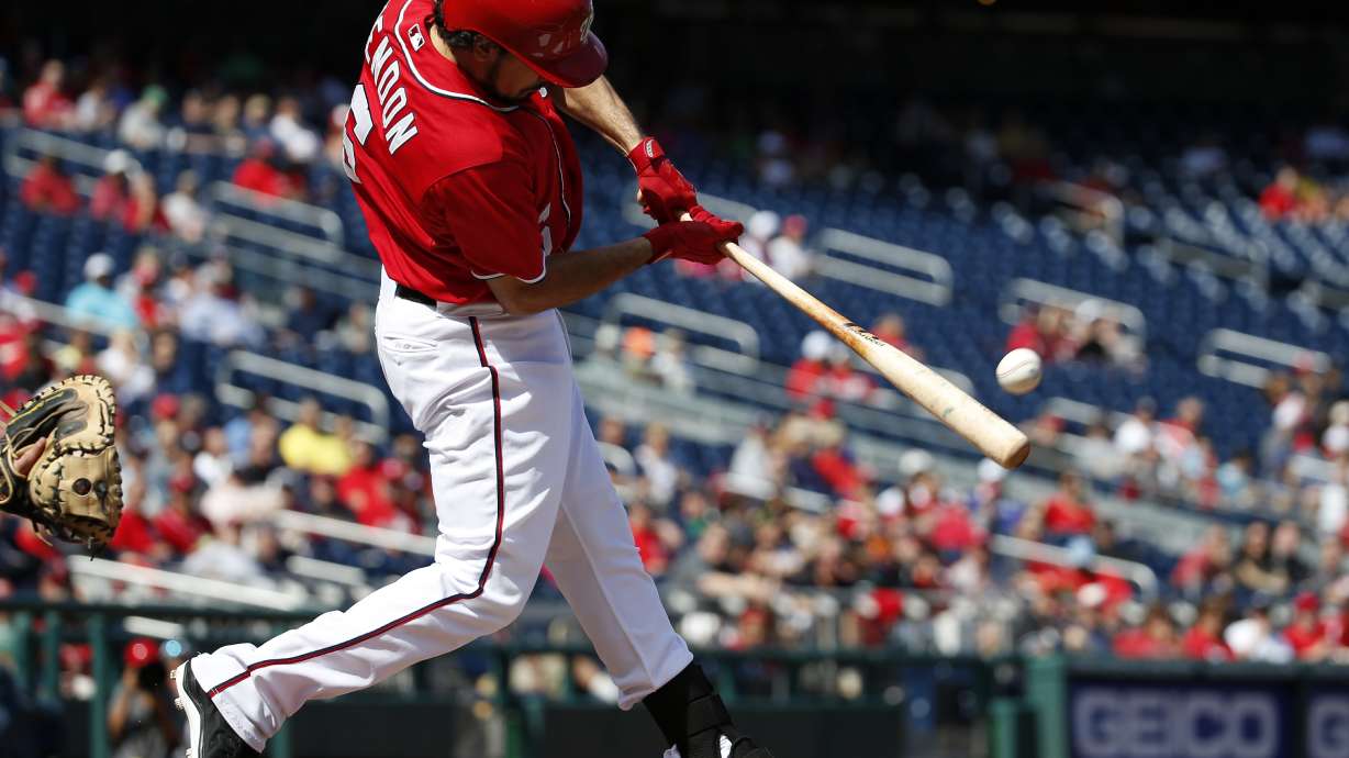 Nats clinch NL home-field edge, split with Marlins