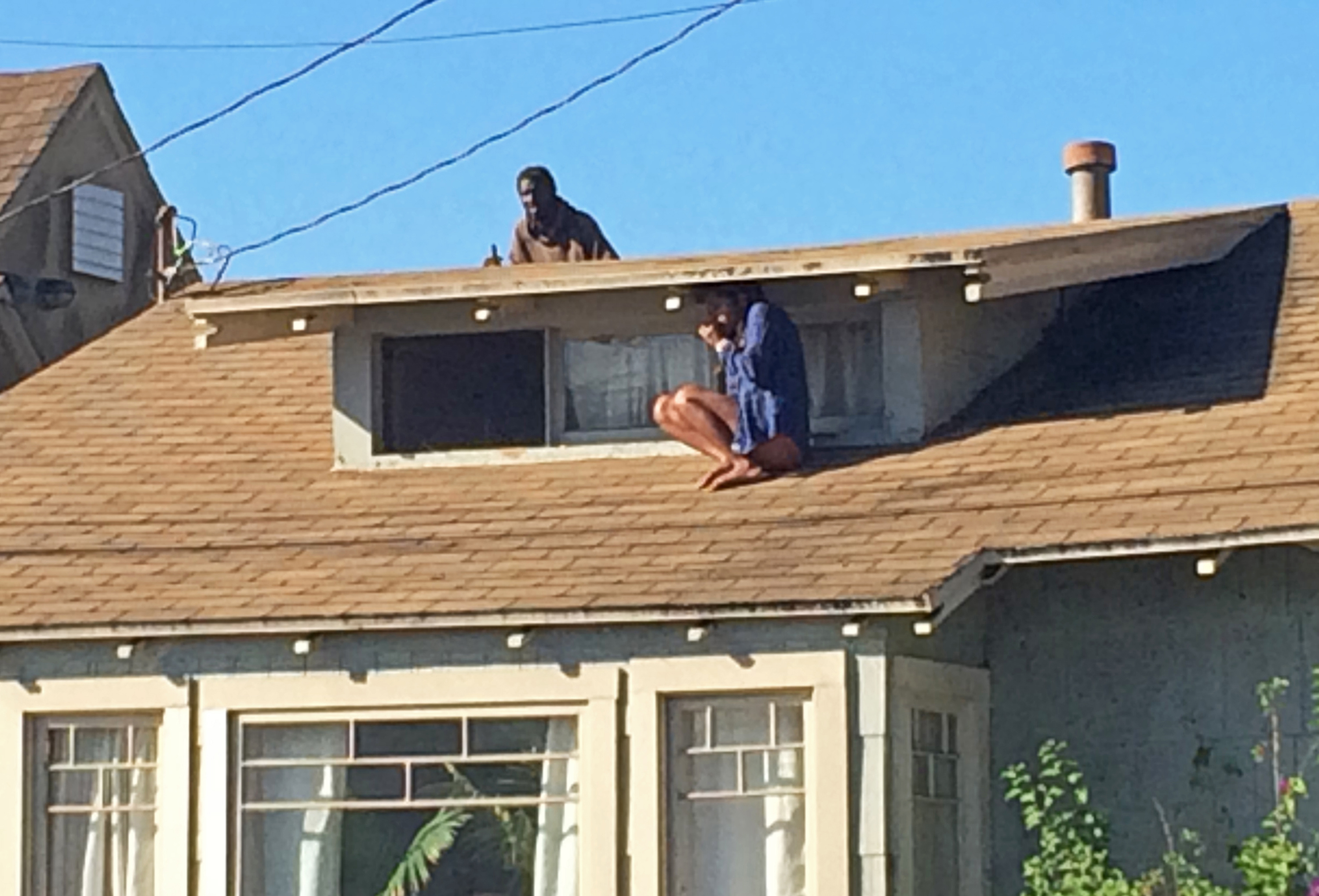 Man accused of following woman on roof is charged
