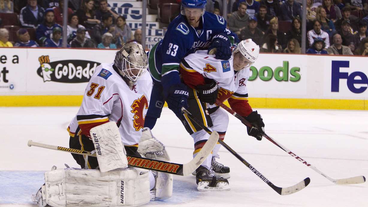 Canucks' Miller, Eriksson team to blank Flames